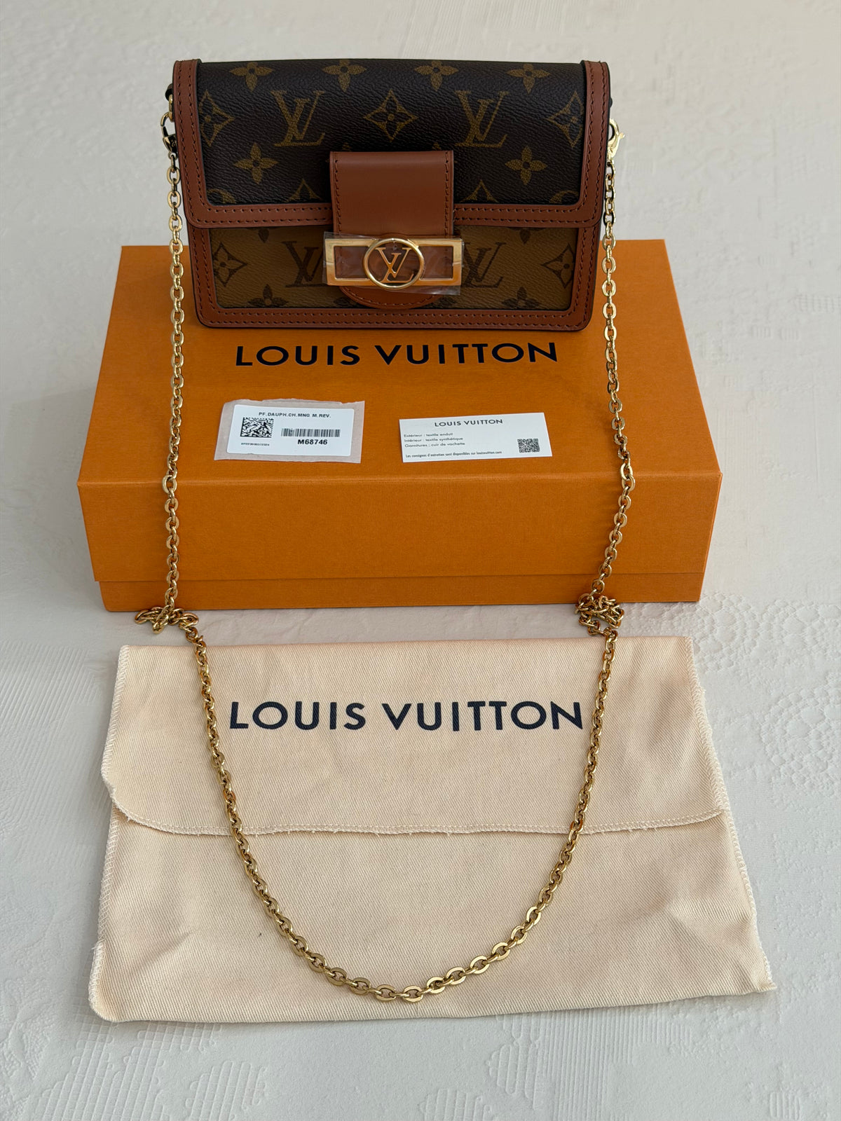 Louis Vuitton Dauphine – Portafoglio con catena Monogram