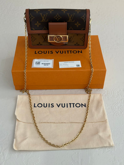 Louis Vuitton Dauphine – Portafoglio con catena Monogram