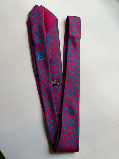 Hermès – Cravatta in seta fucsia e azzurra con motivo H