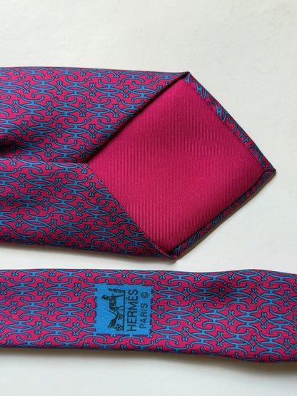 Hermès – Cravatta in seta fucsia e azzurra con motivo H
