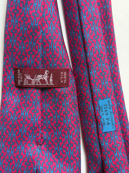 Hermès – Cravatta in seta fucsia e azzurra con motivo H