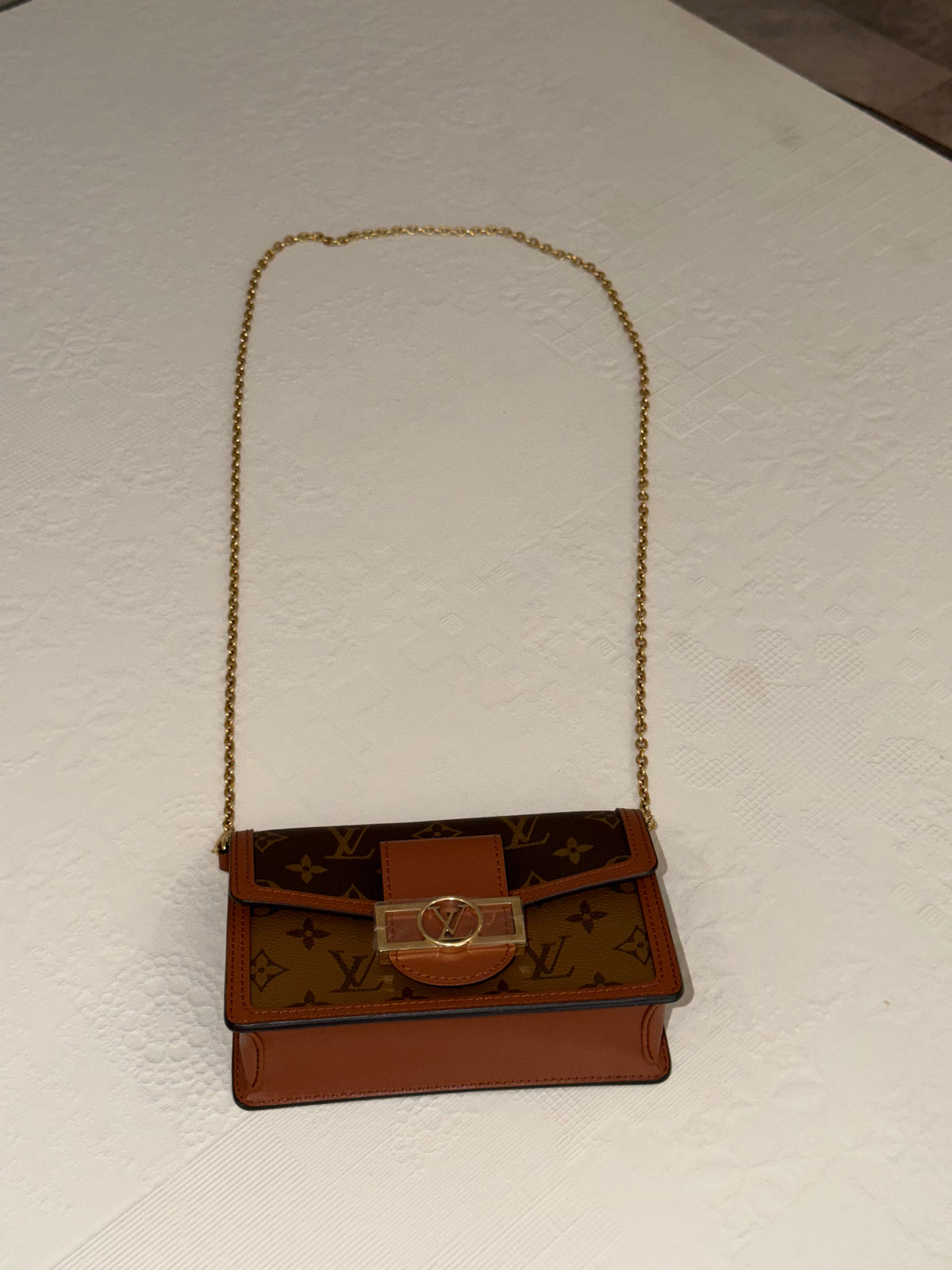 Louis Vuitton Dauphine – Portafoglio con catena Monogram