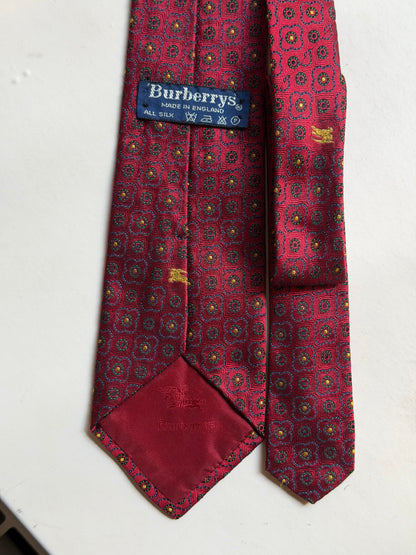 Burberry – Cravatta in seta rossa con motivo decorativo