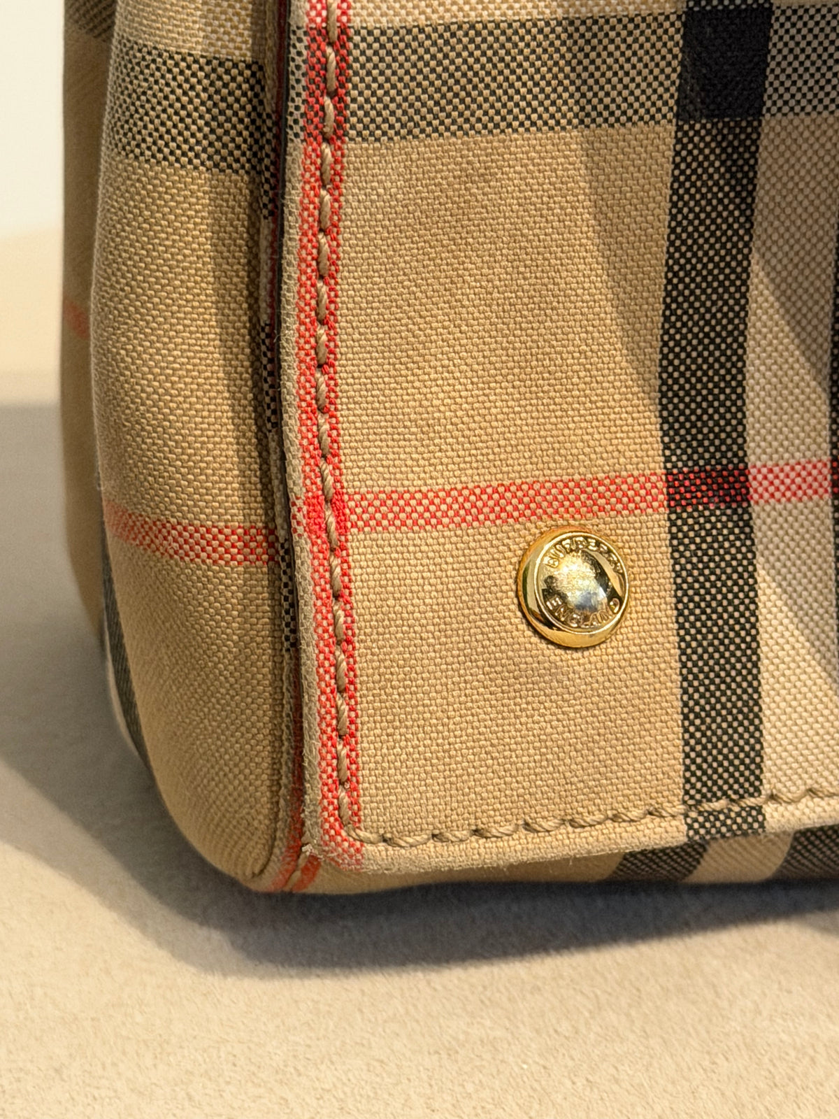 Burberry – Borsa a tracolla Vintage Check beige e nera