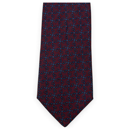 Hermès – Cravatta in seta bordeaux con motivo geometrico