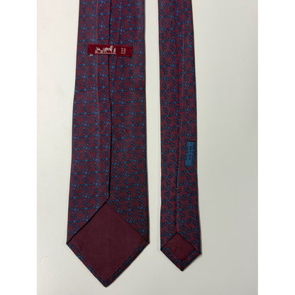 Hermès – Cravatta in seta bordeaux con motivo geometrico