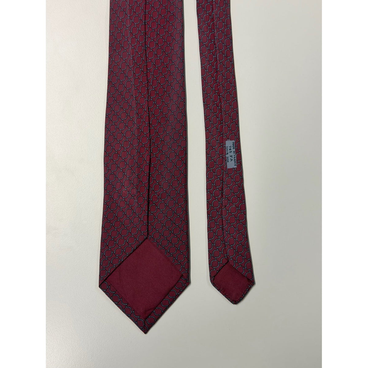 Hermès – Cravatta in seta bordeaux