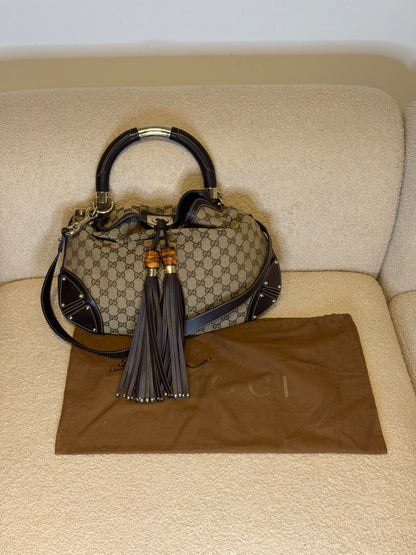 Gucci – Borsa a mano in tessuto GG con nappe