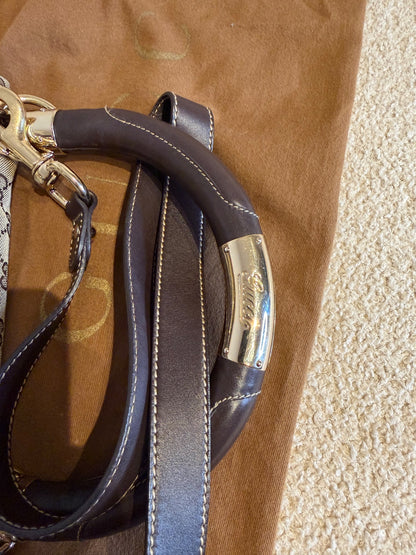 Gucci – Borsa a mano in tessuto GG con nappe