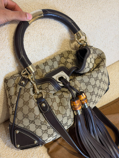 Gucci – Borsa a mano in tessuto GG con nappe