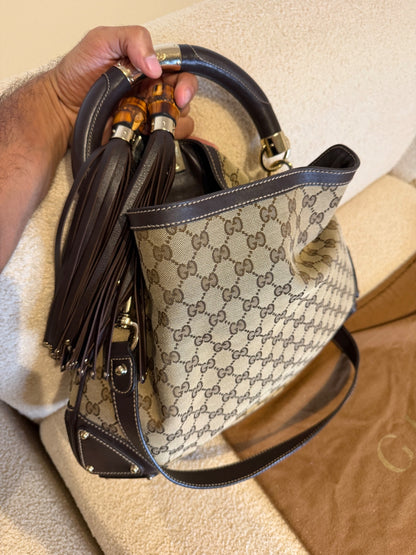 Gucci – Borsa a mano in tessuto GG con nappe