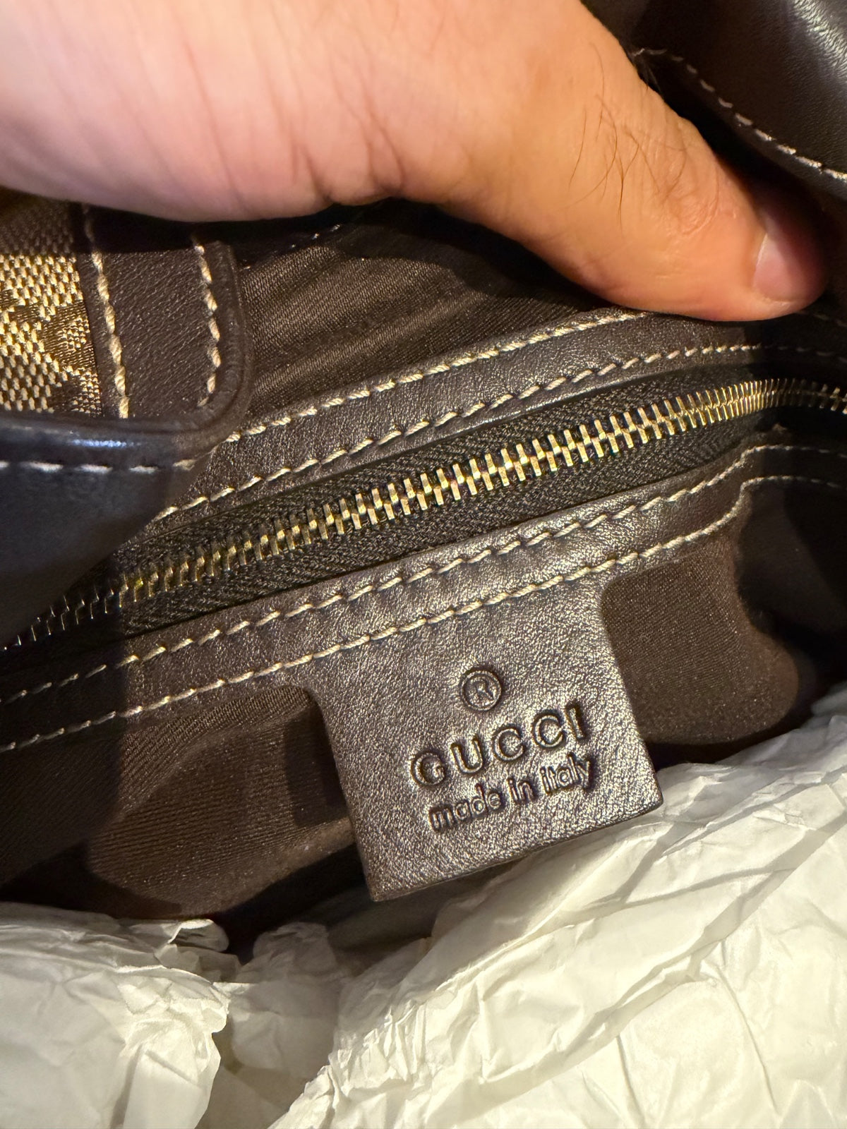 Gucci – Borsa a mano in tessuto GG con nappe