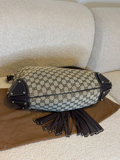 Gucci – Borsa a mano in tessuto GG con nappe