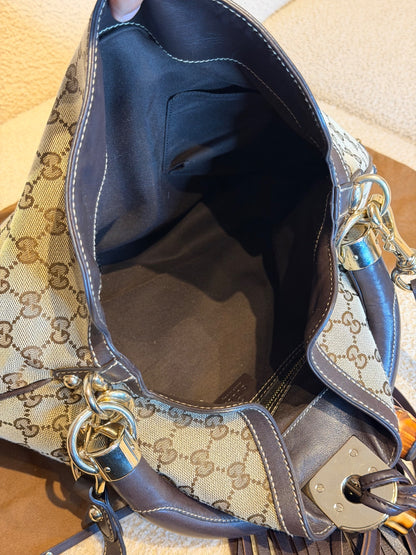 Gucci – Borsa a mano in tessuto GG con nappe